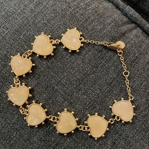 Tory Burch gold heart bracelet.